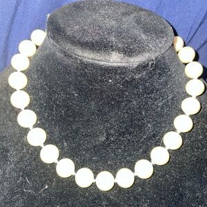 7 vintage necklaces.